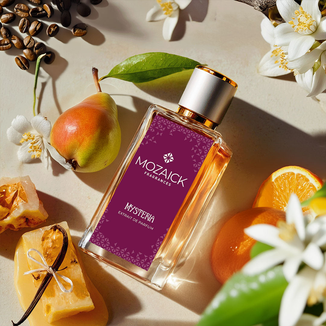 MYSTERIA Extrait de Parfum 50 ml by MOZAICK – bottle with pear, orange, coffee beans and a vanilla pod